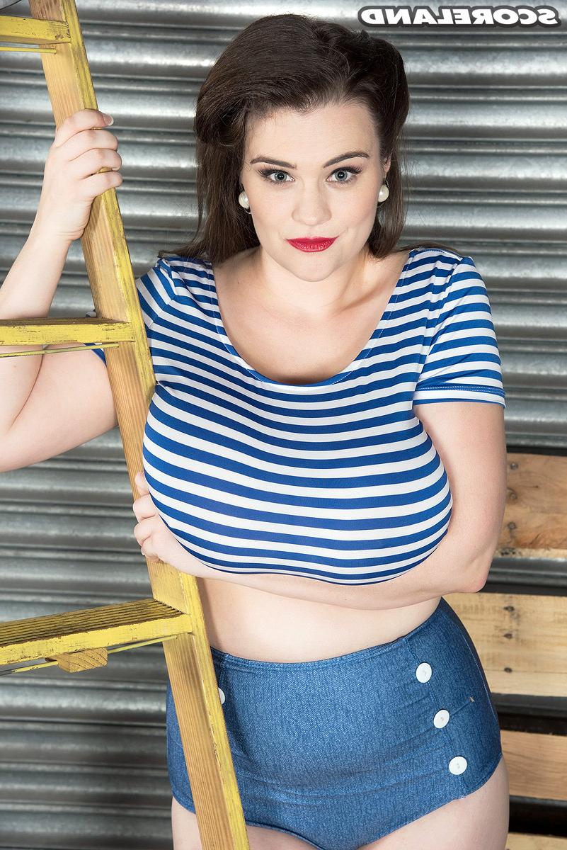 16P Solo model Tiggle Bitties puts her knockers on display upon a ladder