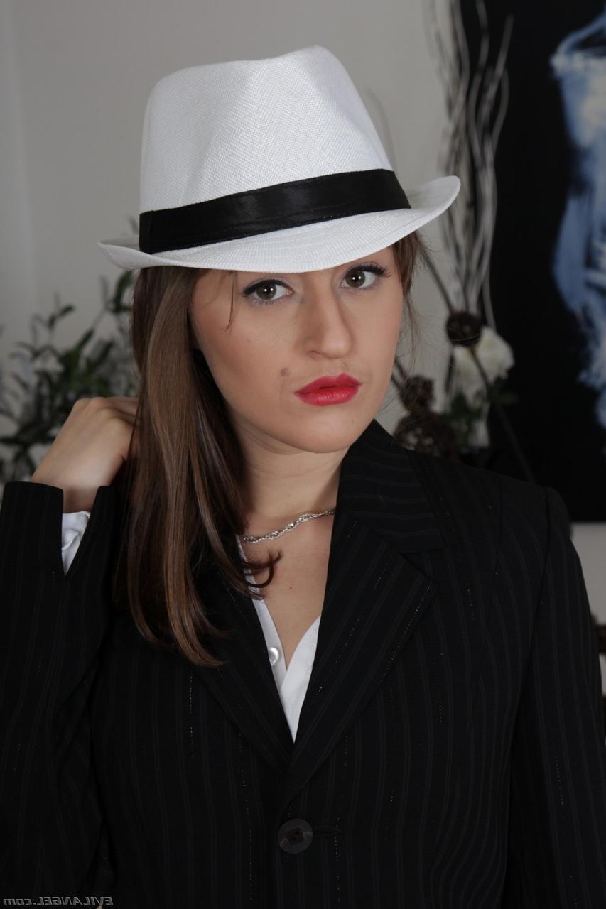 18P Kinky chick in fishnets Kendra Star teases with her natural tits on a chair