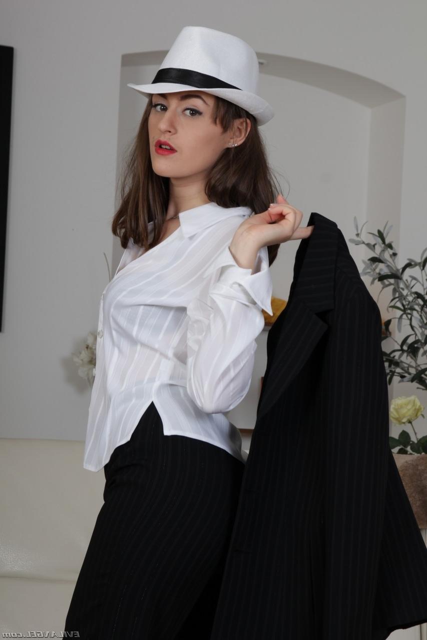18P Kinky chick in fishnets Kendra Star teases with her natural tits on a chair