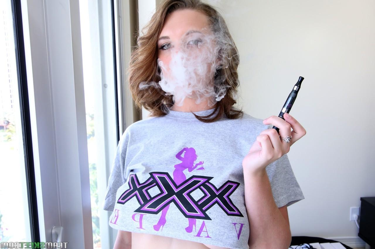 20P Busty Brooke Wylde plays with her amazing natural tits after smoking an e-cig