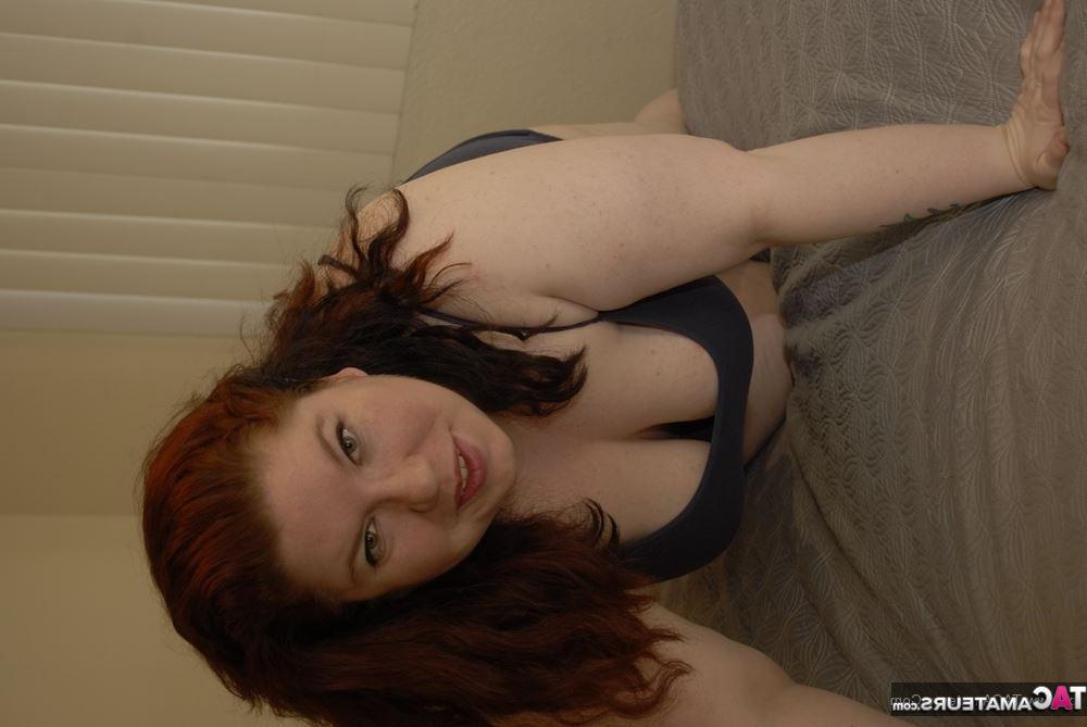20P Redheaded amateur BBW Inked Oracle plays with her nipples during solo action