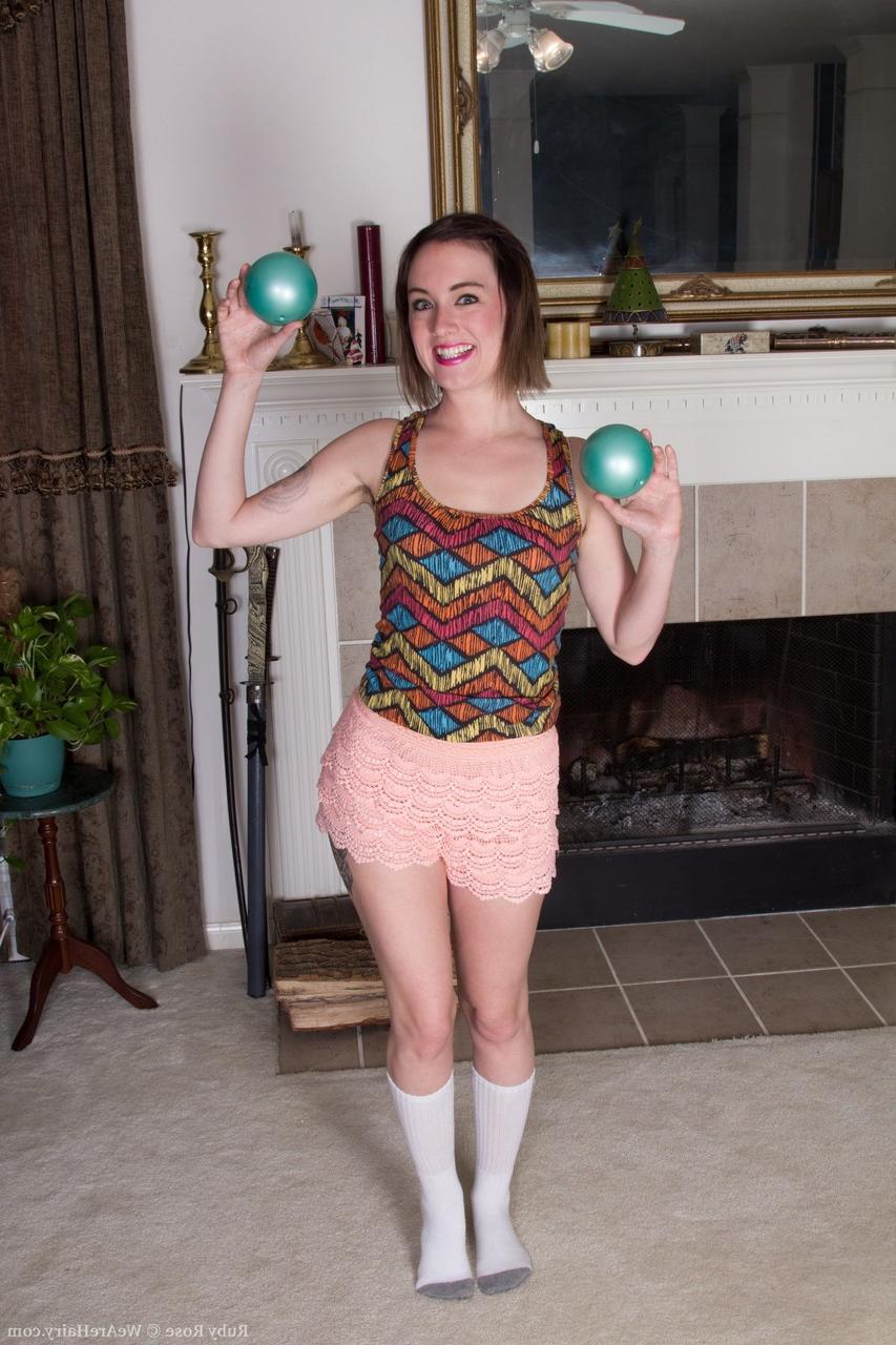 17P Petite Ruby Rose removes frilly panties & stretches to show her hairy muff