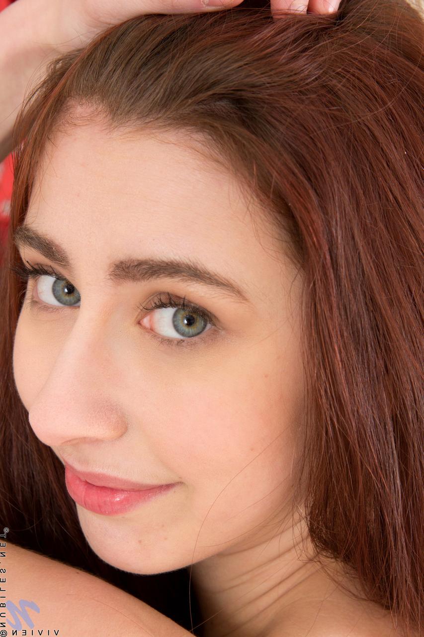 20P Redheaded beauty Vivien undressing and masturbating in the closet
