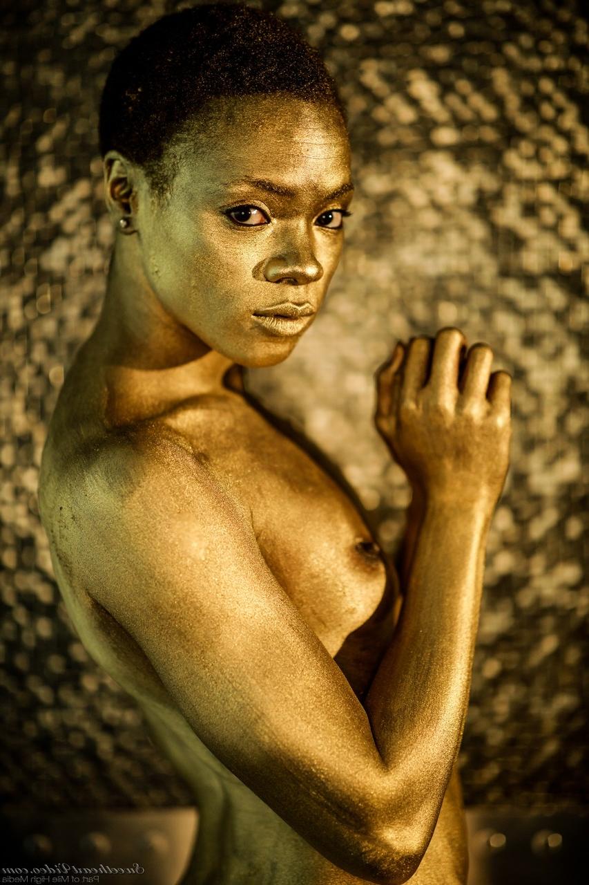 15P Ebony chick Ana Foxxx models for a nude solo shoot in a confident manner