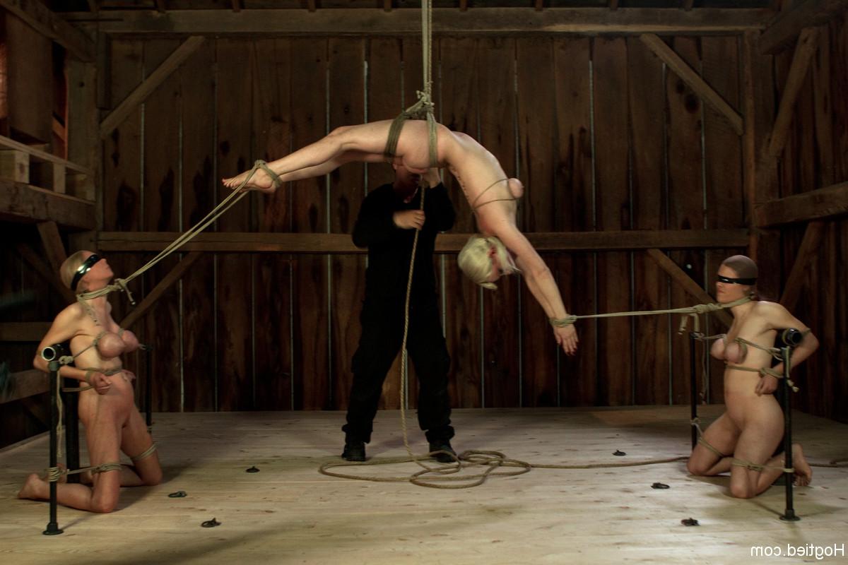 20P Chesty babes have their tits tied up tight in a kinky BDSM scene