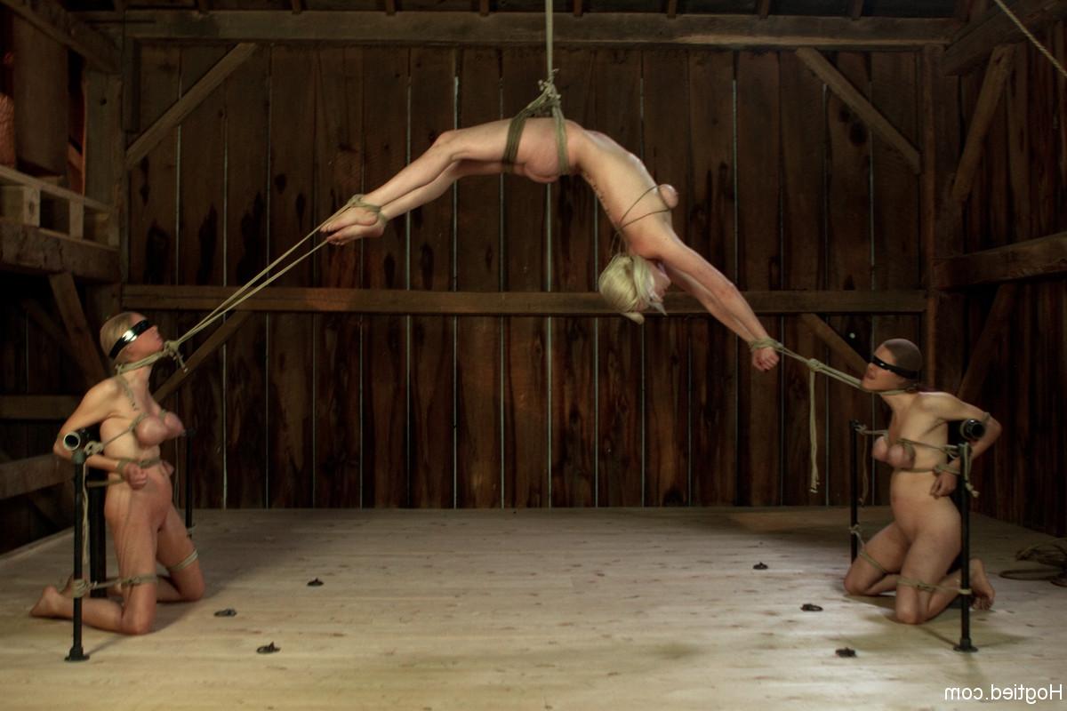 20P Chesty babes have their tits tied up tight in a kinky BDSM scene