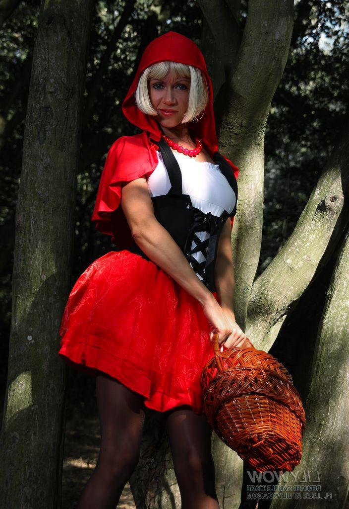 15P Blonde MILF masturbates in the woods while wearing a Red Riding Hood outfit