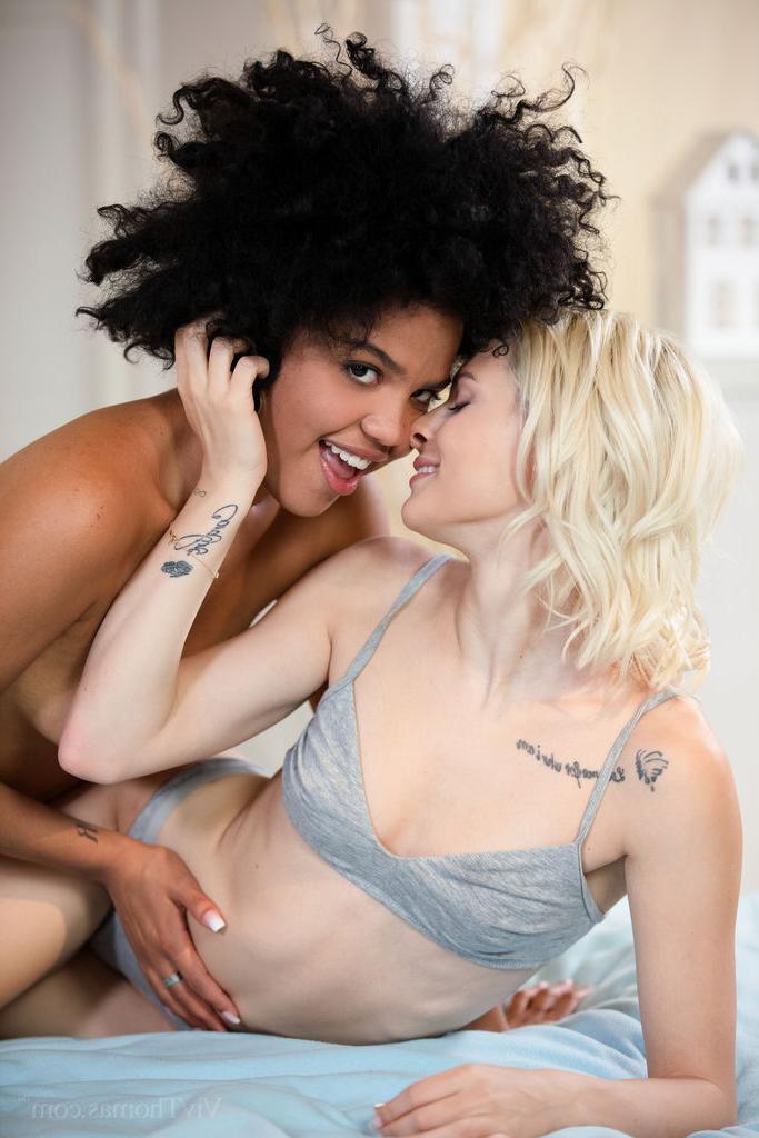 16P Selva Lapiedra & Christy White have interracial lesbian sex on a bed