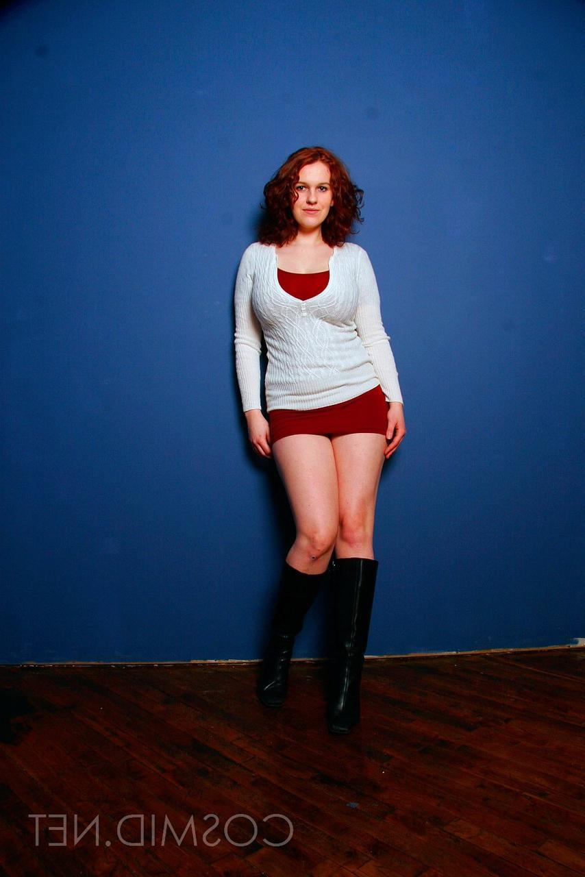 16P Chubby redhead Eva sets her big natural tits free of a brassiere