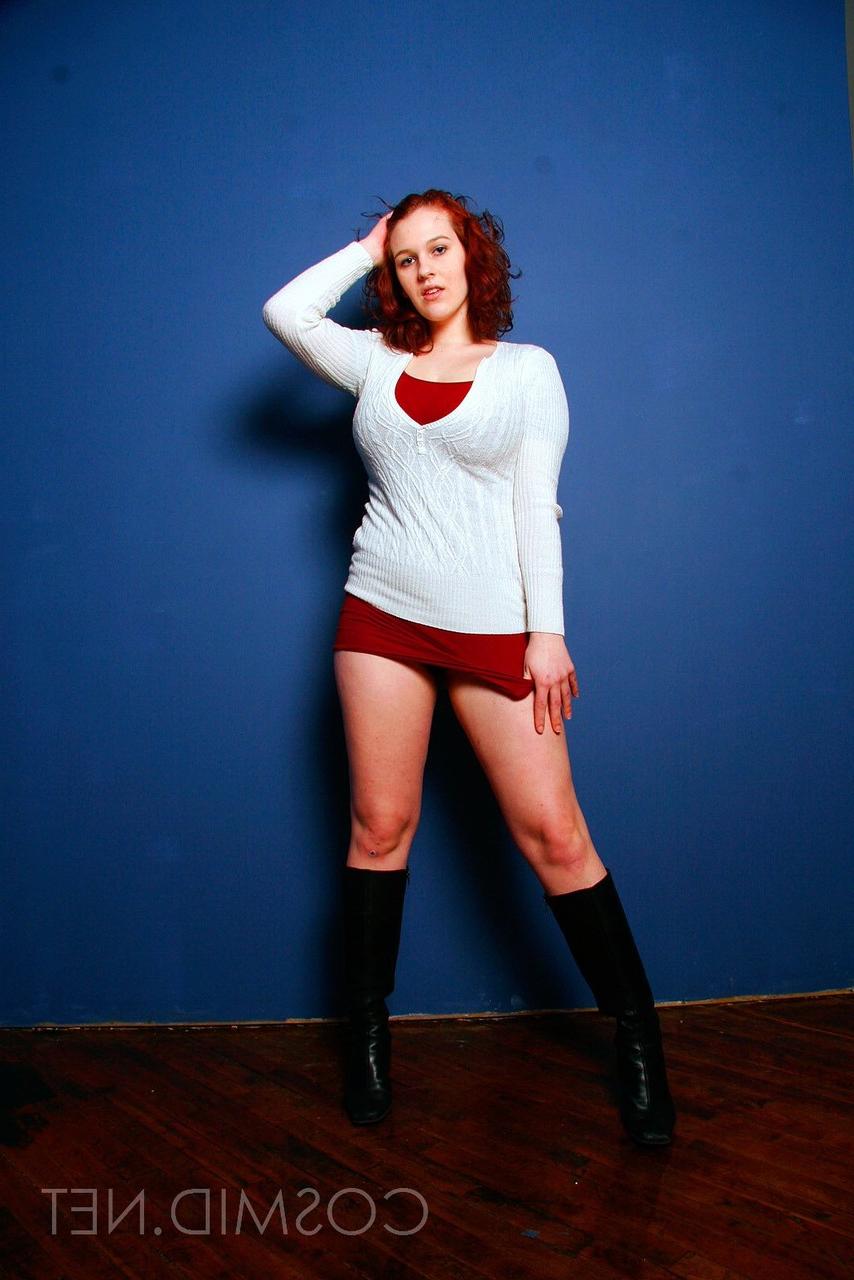 16P Chubby redhead Eva sets her big natural tits free of a brassiere