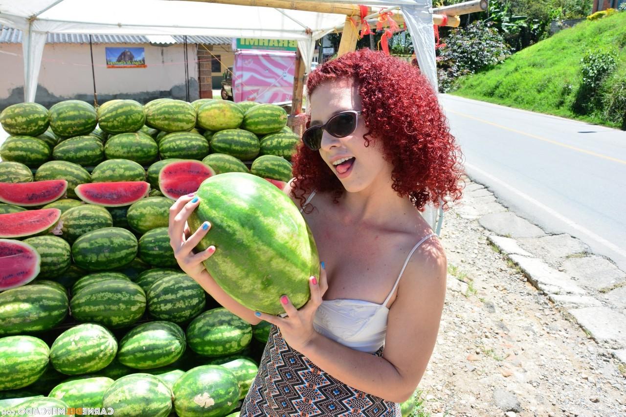 17P Curly redhead Latina with small tits & big clit gets nude to eat a melon
