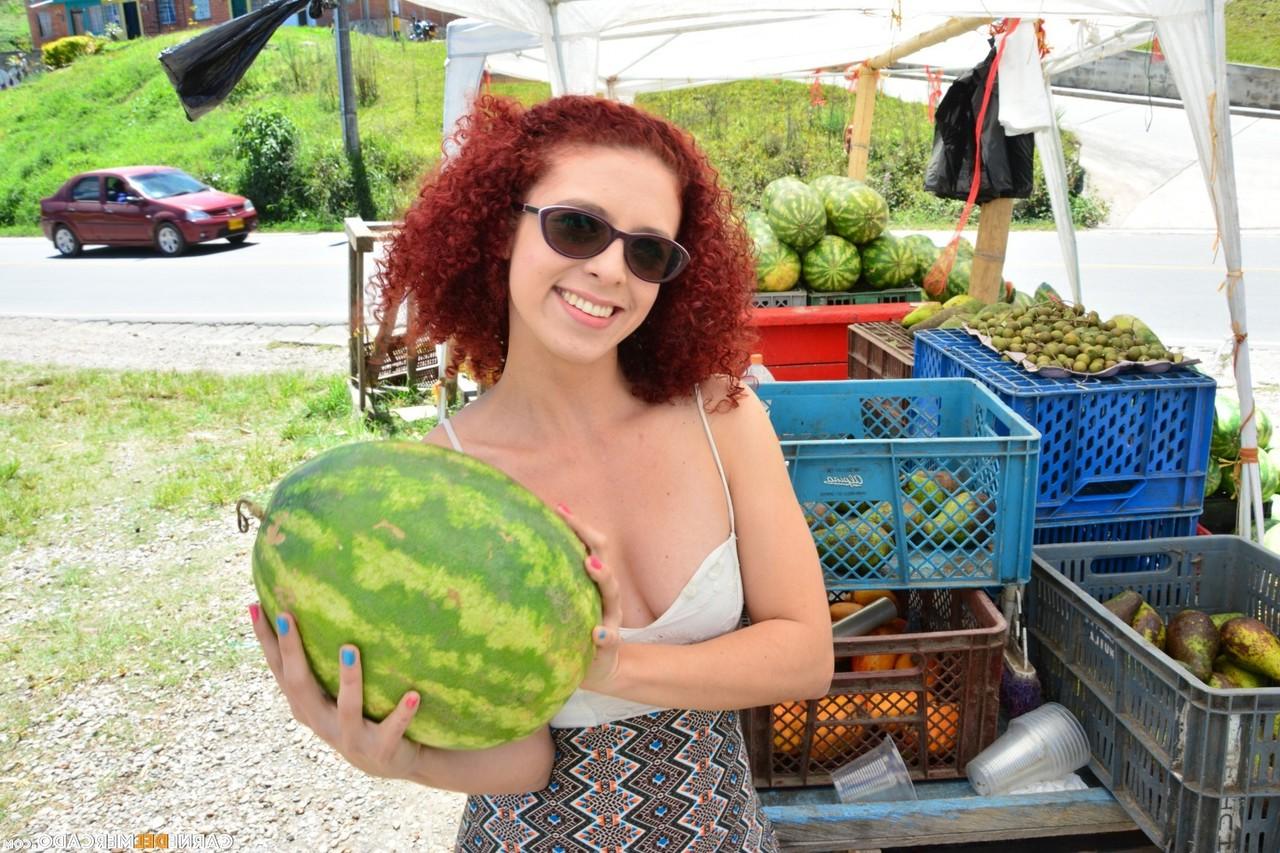 17P Curly redhead Latina with small tits & big clit gets nude to eat a melon