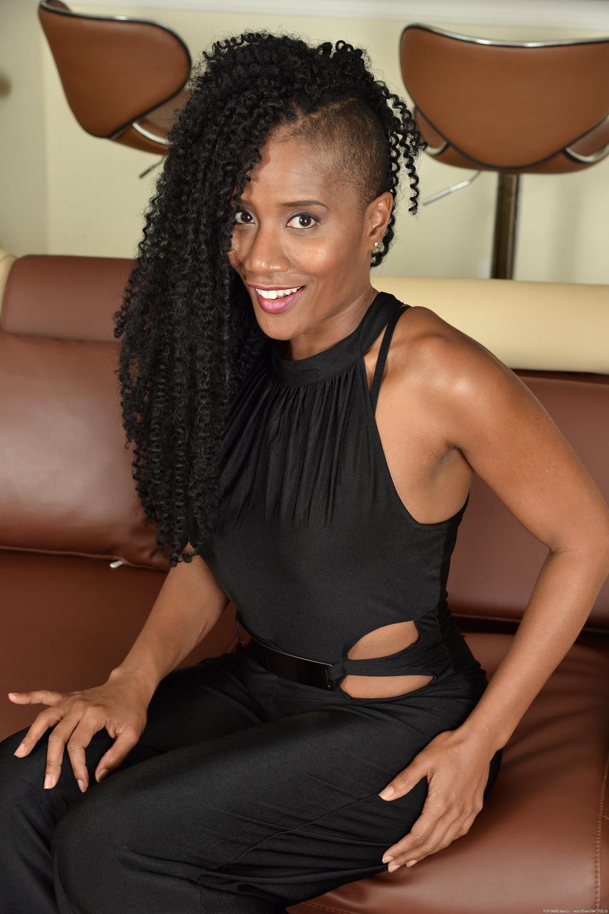 20P Curly-haired ebony MILF JetSet Jasmine exposes her fabulous curves in a solo