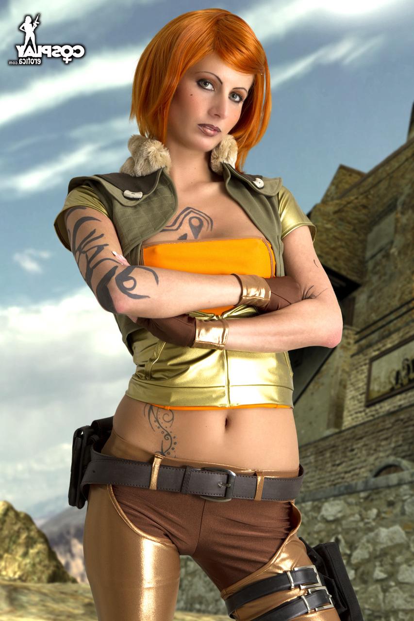 12P Redheaded cosplayer with firm tits grabs her tight ass while showing her cunt
