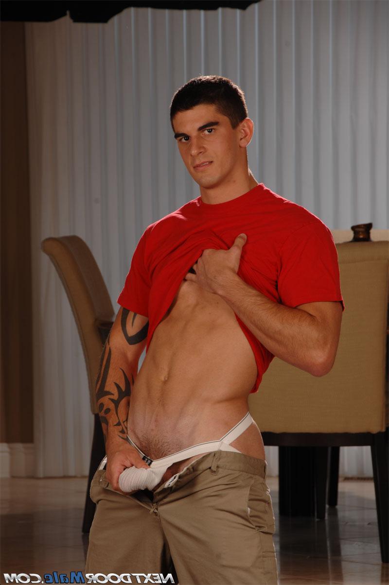 20P Strong brunette Tyler Torro unveils his muscular inked body and stiff dick
