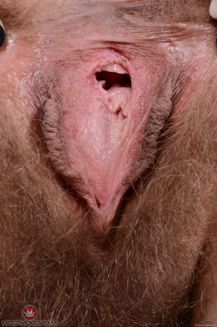 20P Lingerie-clad hippie Felicia Fisher showcasing her hairy vulva on the sofa