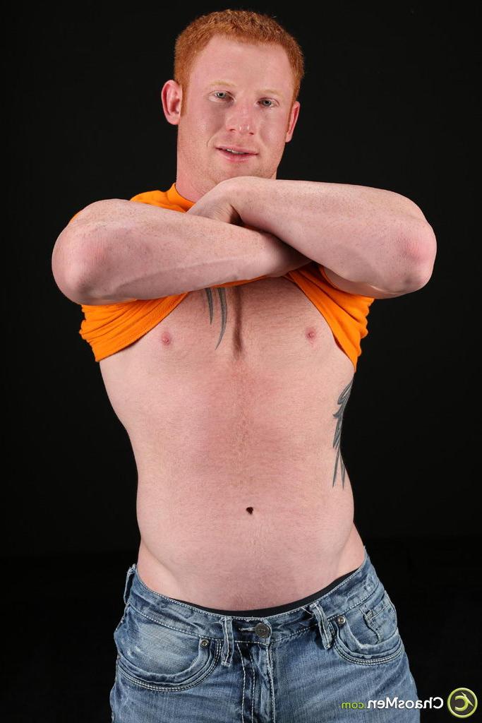 20P Muscular redheaded gay model Jordan Cleary strips, poses naked & masturbates