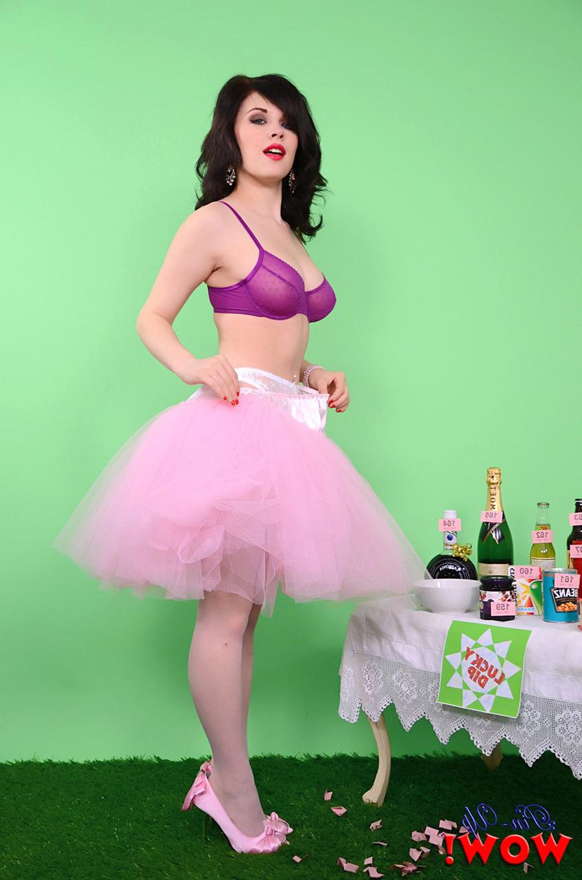 17P Pinup model Jocelyn-Kay lets her hair down before uncupping her nice breasts