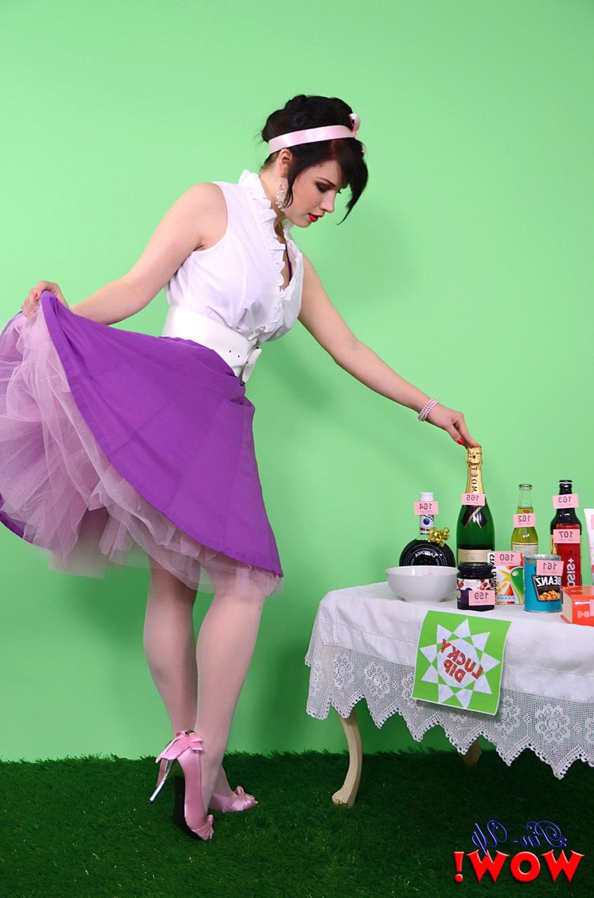 17P Pinup model Jocelyn-Kay lets her hair down before uncupping her nice breasts