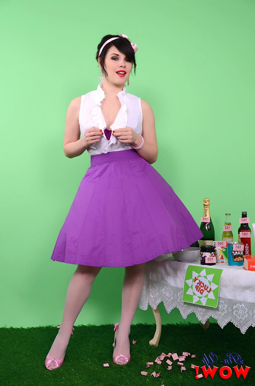 17P Pinup model Jocelyn-Kay lets her hair down before uncupping her nice breasts