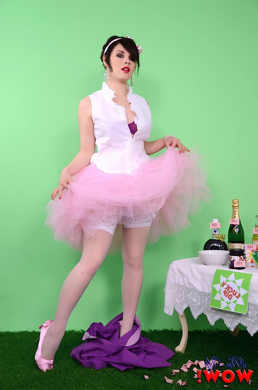 17P Pinup model Jocelyn-Kay lets her hair down before uncupping her nice breasts