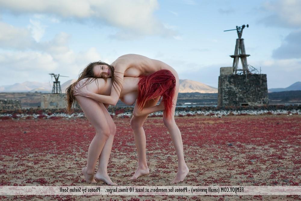 12P Ariel and her girlfriend pose totally naked somewhat close to the water