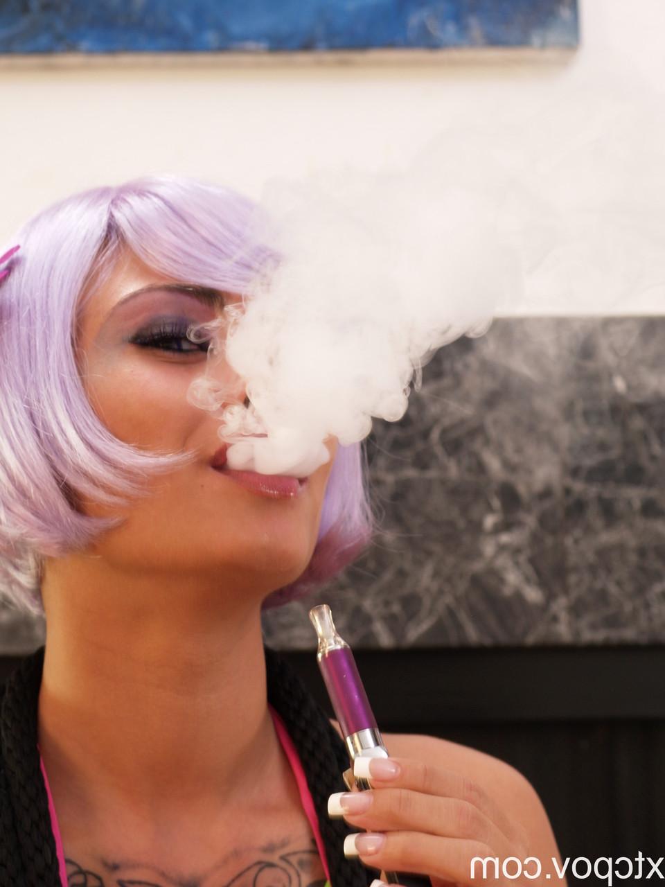 20P Purple haired babe Rinka smokes before sucking a dick and riding it