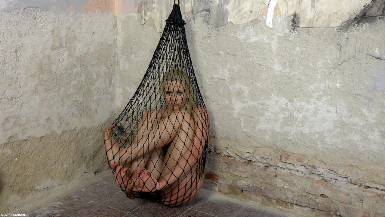 20P Struggling captive nude Katy Sky gets toyed while trying to escape a net