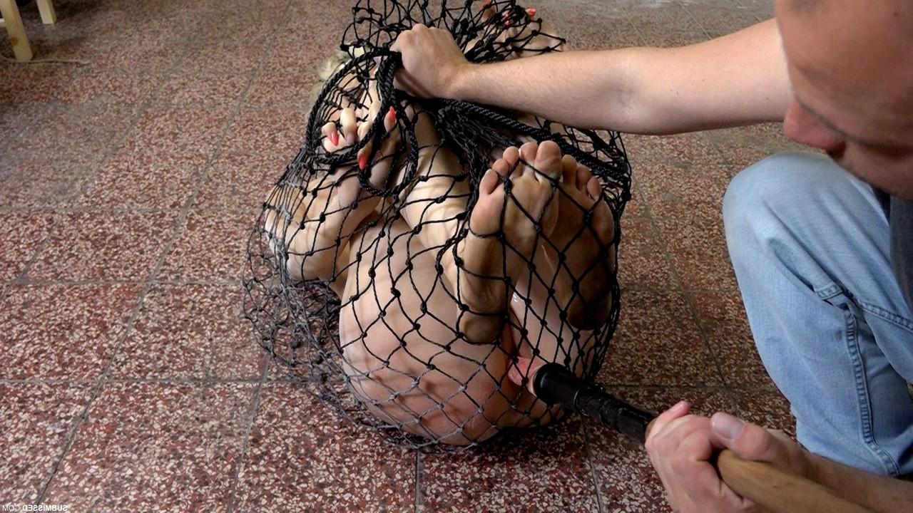 20P Struggling captive nude Katy Sky gets toyed while trying to escape a net
