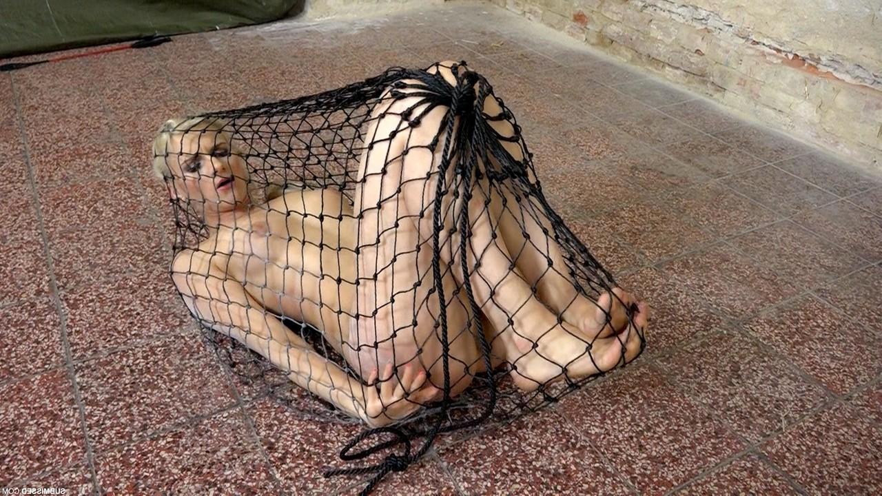 20P Struggling captive nude Katy Sky gets toyed while trying to escape a net