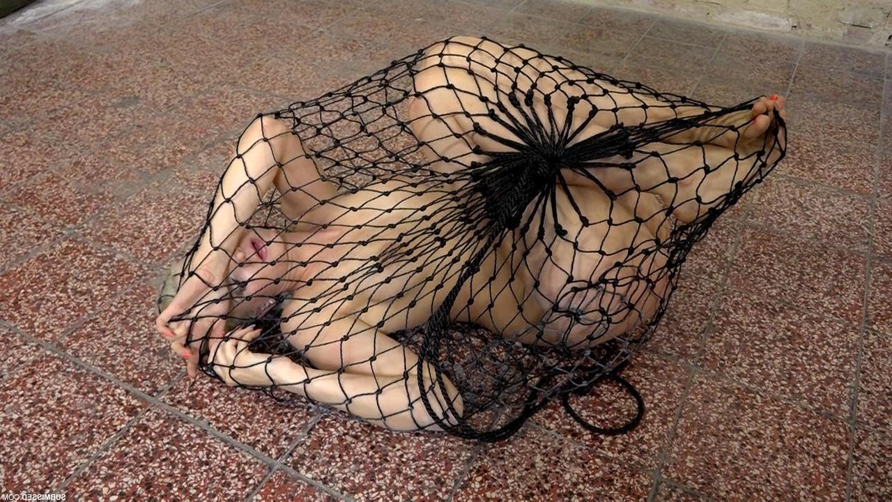 20P Struggling captive nude Katy Sky gets toyed while trying to escape a net