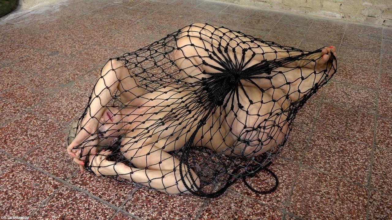 20P Struggling captive nude Katy Sky gets toyed while trying to escape a net