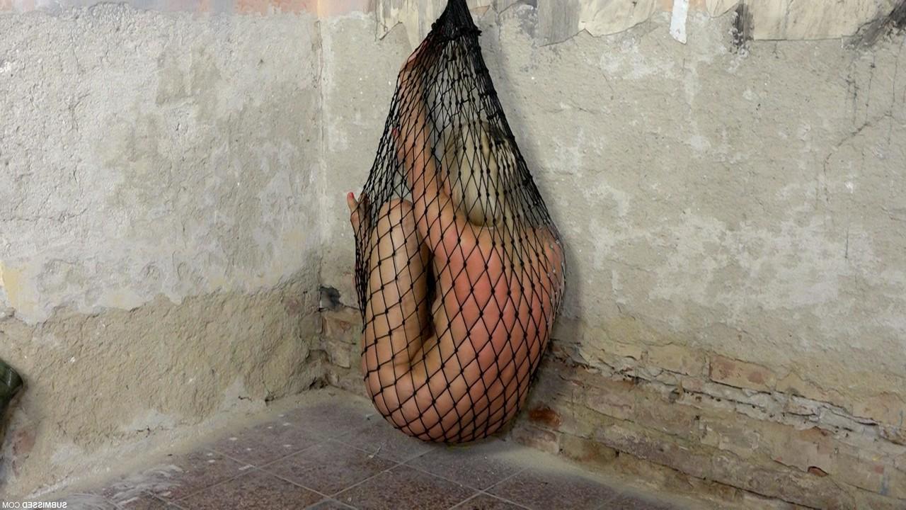 20P Struggling captive nude Katy Sky gets toyed while trying to escape a net