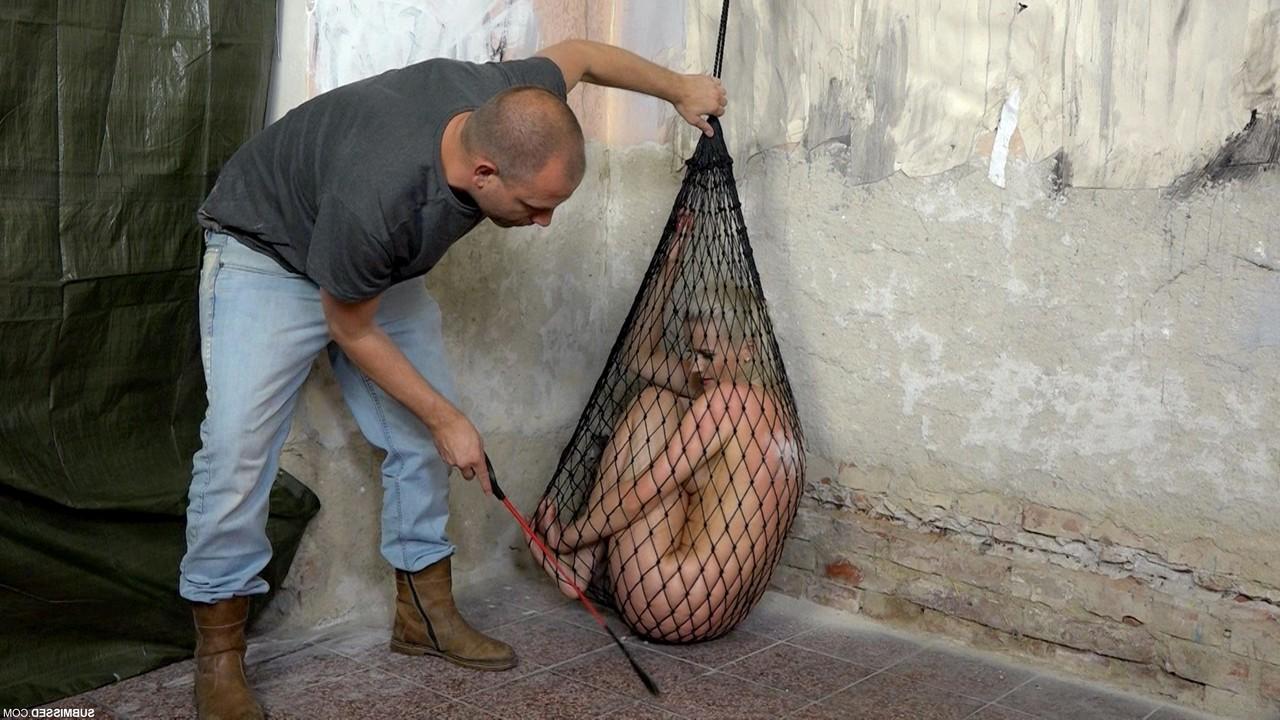 20P Struggling captive nude Katy Sky gets toyed while trying to escape a net
