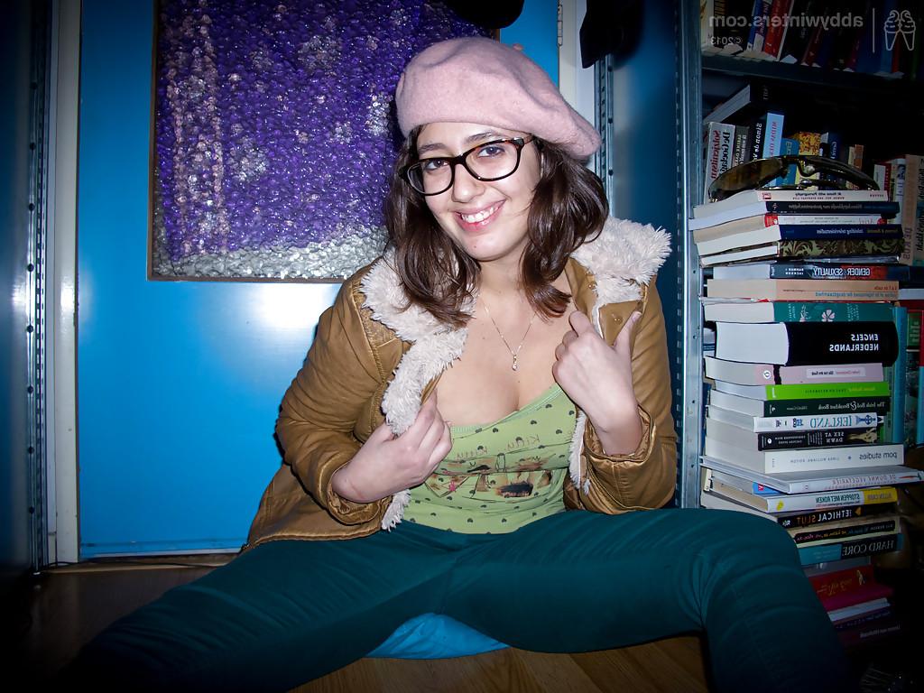 16P Young fatty Ariel D poses in glasses while flashing large natural tits