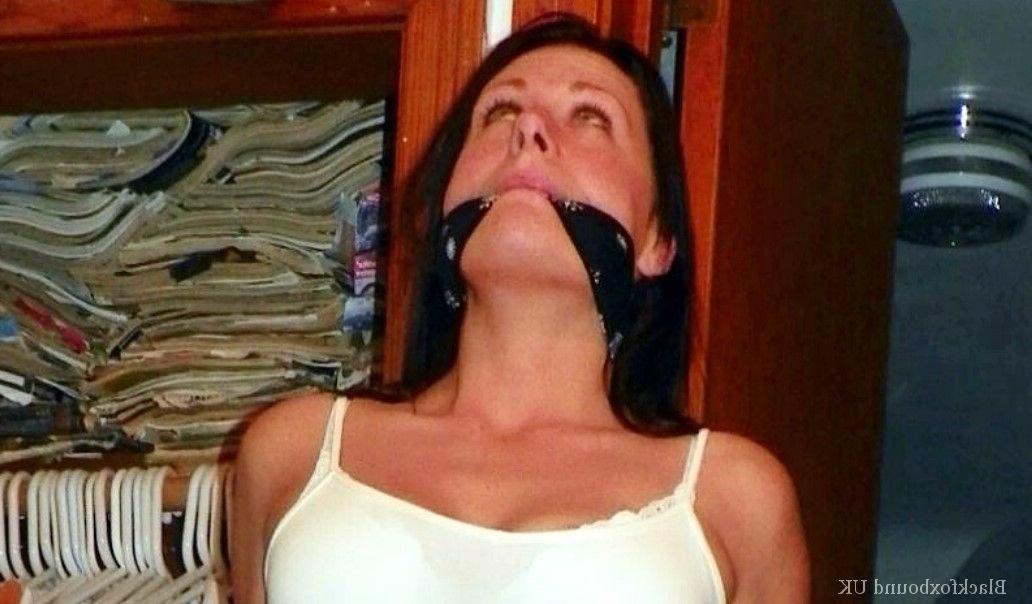 13P Brunette chick is blindfolded and gagged while her arms & legs are restrained