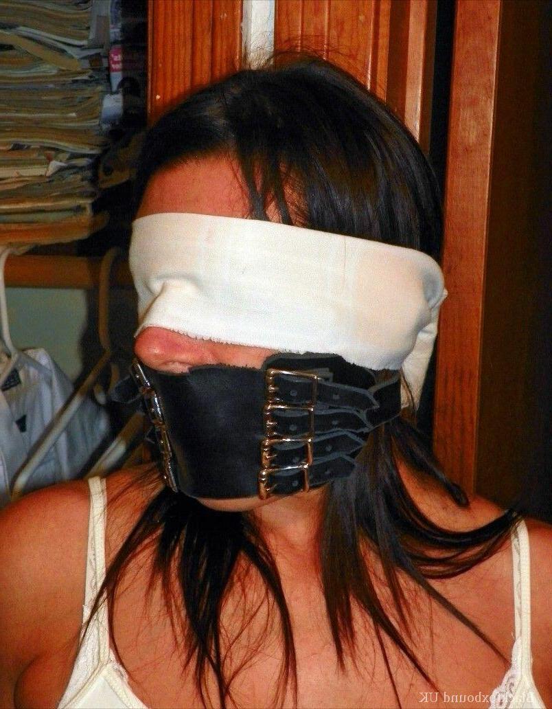 13P Brunette chick is blindfolded and gagged while her arms & legs are restrained