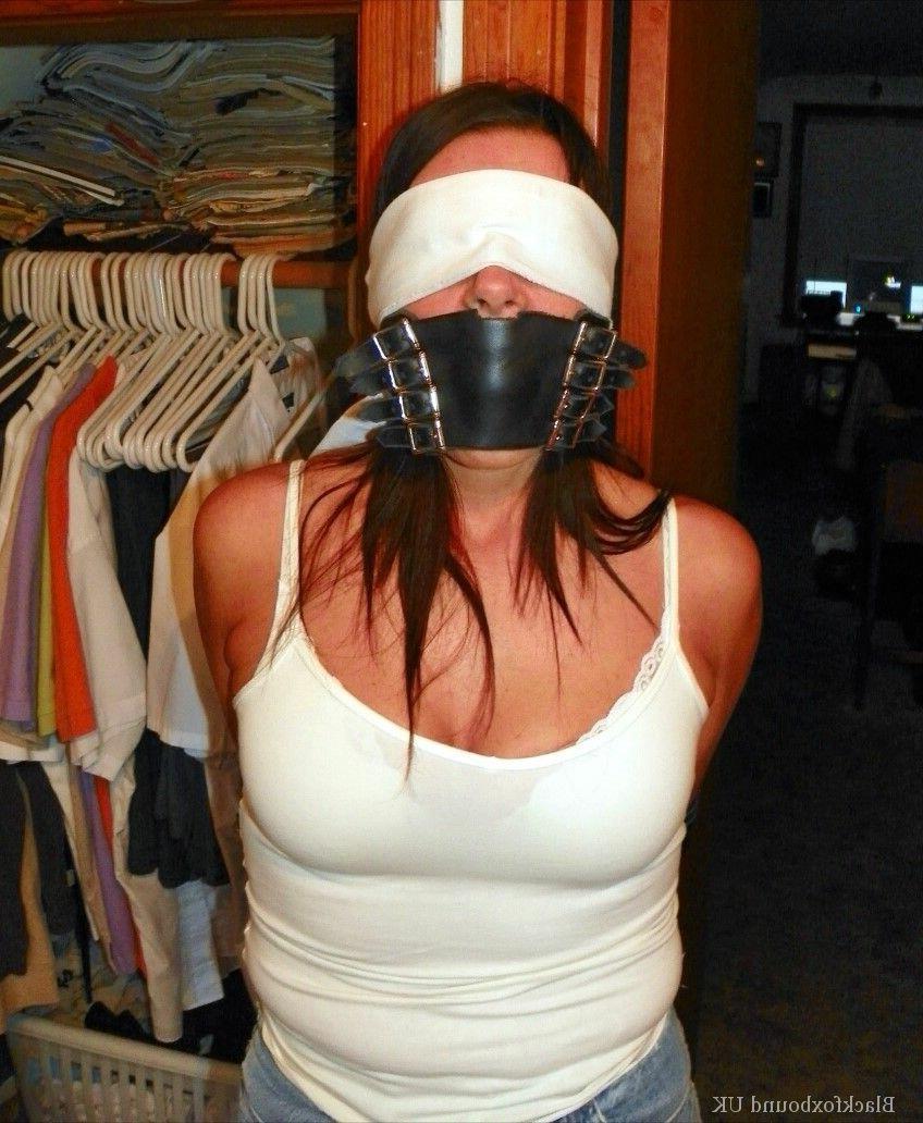 13P Brunette chick is blindfolded and gagged while her arms & legs are restrained