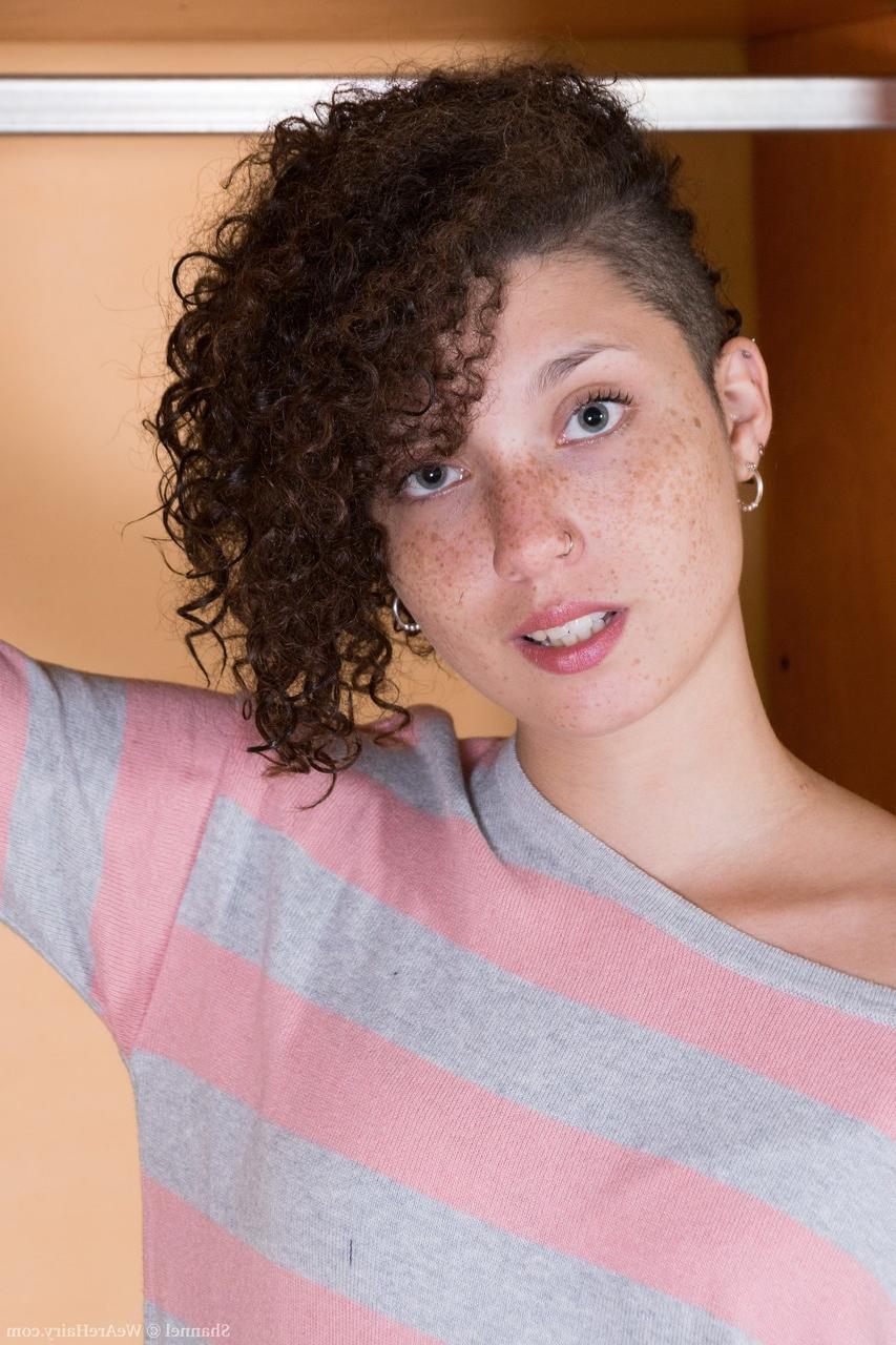 20P Curly haired amateur Shannel displays her hairy vagina up close