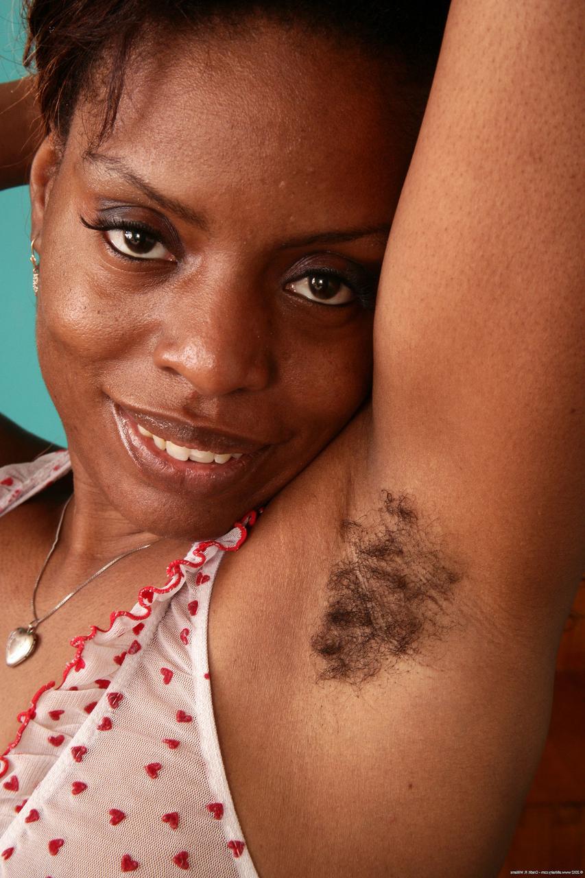 20P Curvy ebony Alexis shows off her big ass and spreads her hairy pussy