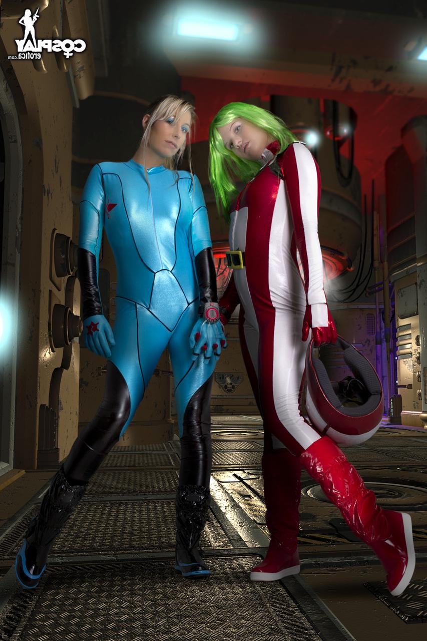 12P Lesbian girls fondle each other while removing cosplay clothing