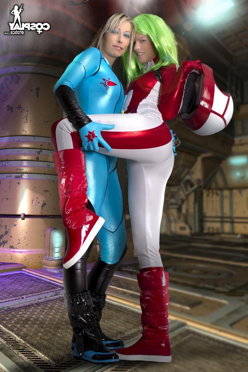 12P Lesbian girls fondle each other while removing cosplay clothing