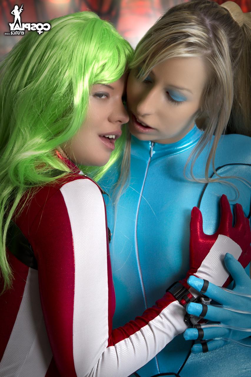 12P Lesbian girls fondle each other while removing cosplay clothing
