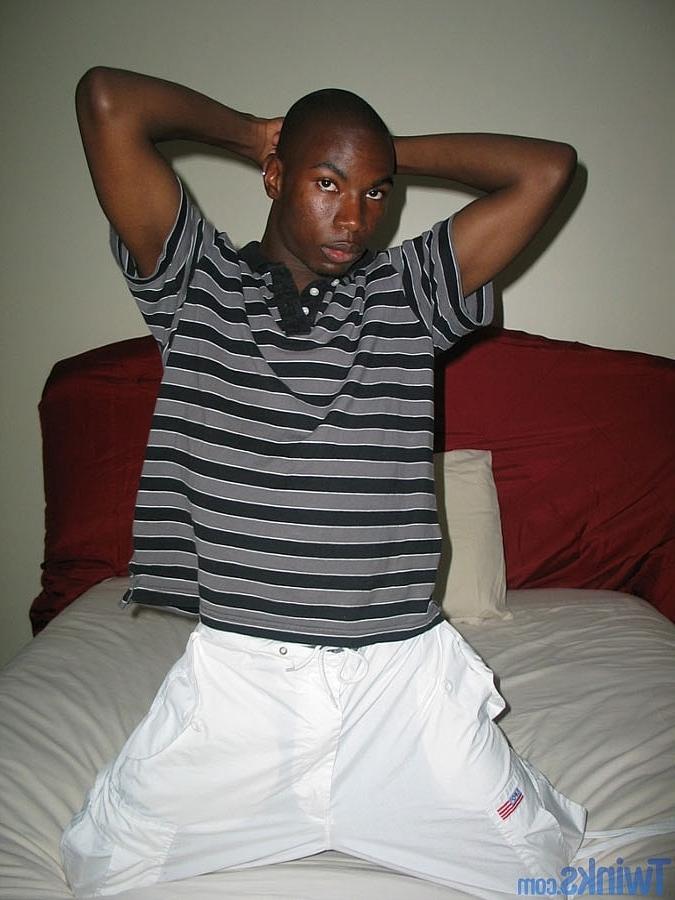 20P Ebony twink strips naked and jerks his shaved cock until he ejaculates