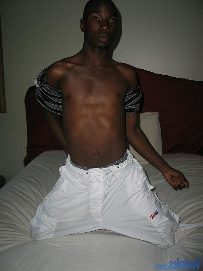 20P Ebony twink strips naked and jerks his shaved cock until he ejaculates