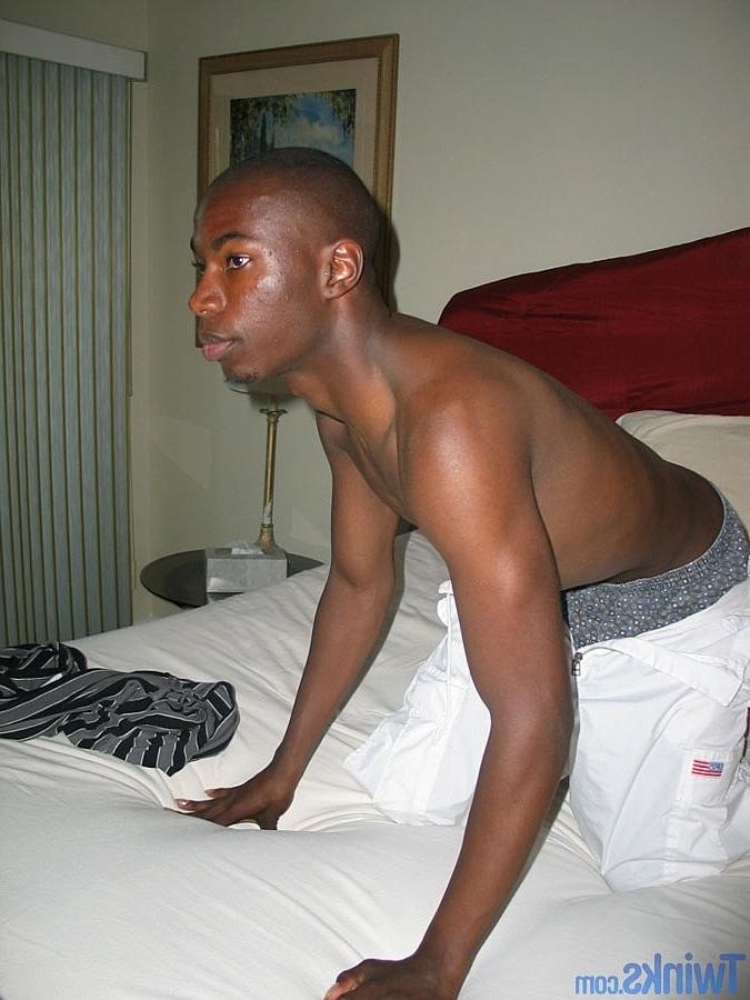 20P Ebony twink strips naked and jerks his shaved cock until he ejaculates