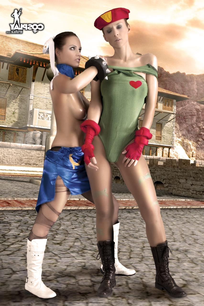 12P Lesbian cosplayers rip open their nylons while going topless