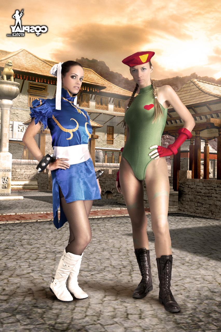 12P Lesbian cosplayers rip open their nylons while going topless