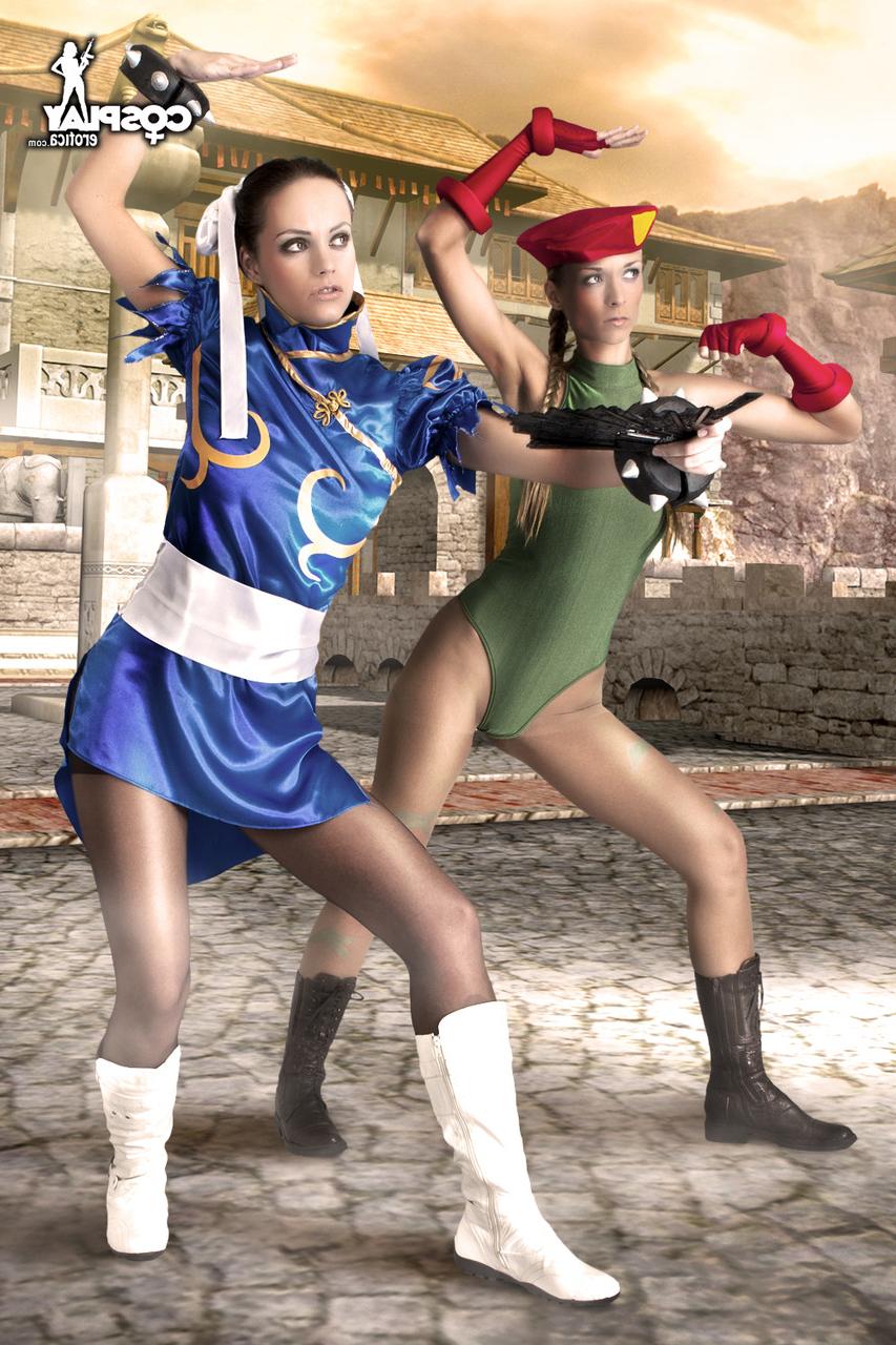 12P Lesbian cosplayers rip open their nylons while going topless