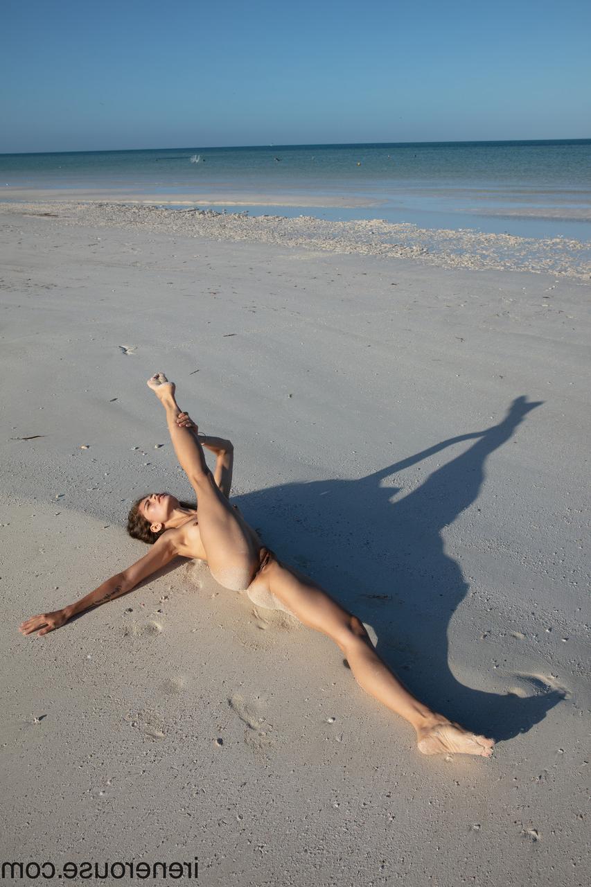 15P Flexible Colombian teen Irene Rouse posing butt naked on a sandy beach